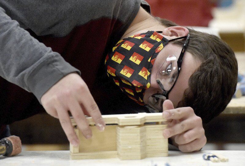 PSU elves — er, students — build toys for Christmas campaign